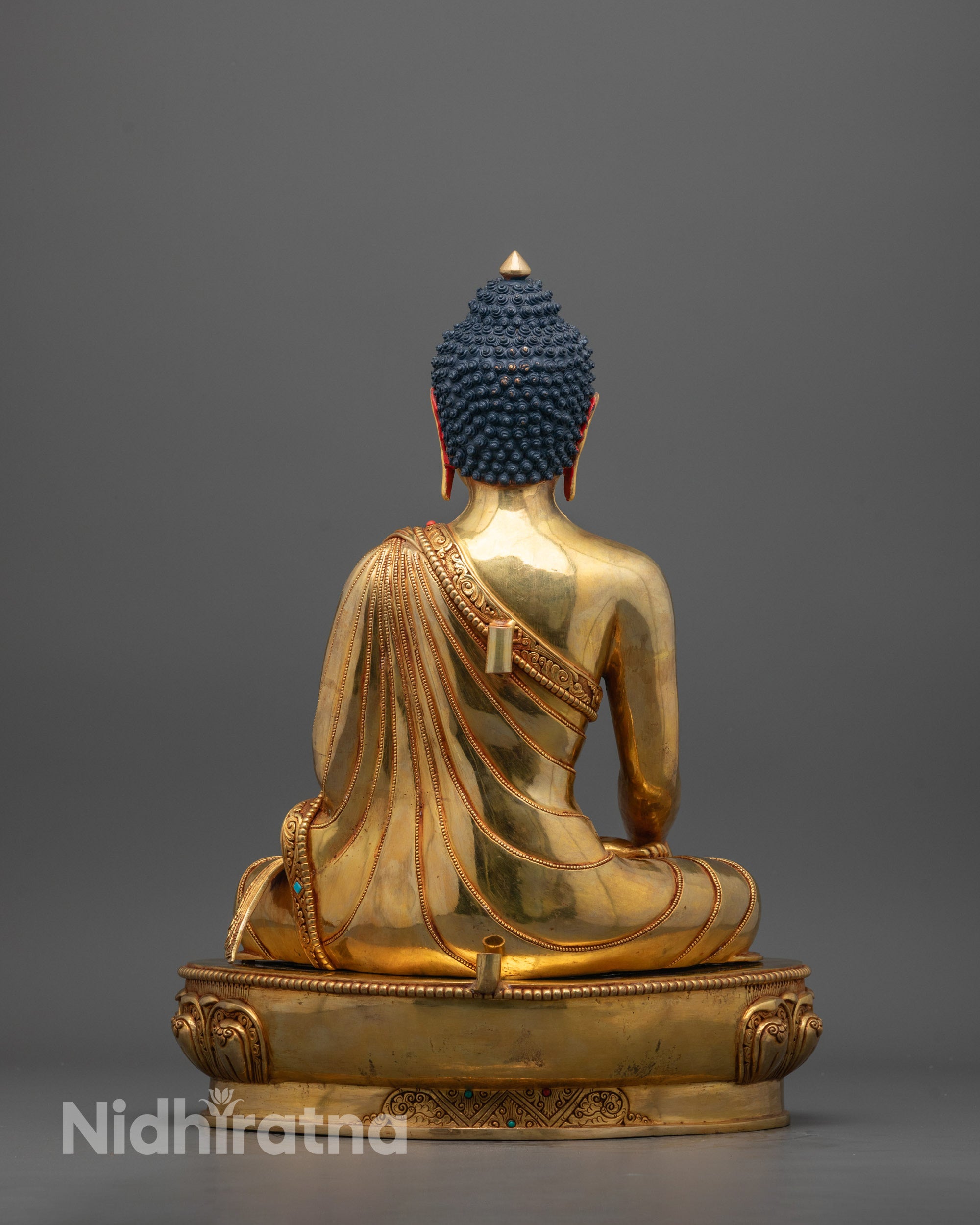 Rear view of the Shakyamuni Buddha statue highlighting the halo and hollow chamber