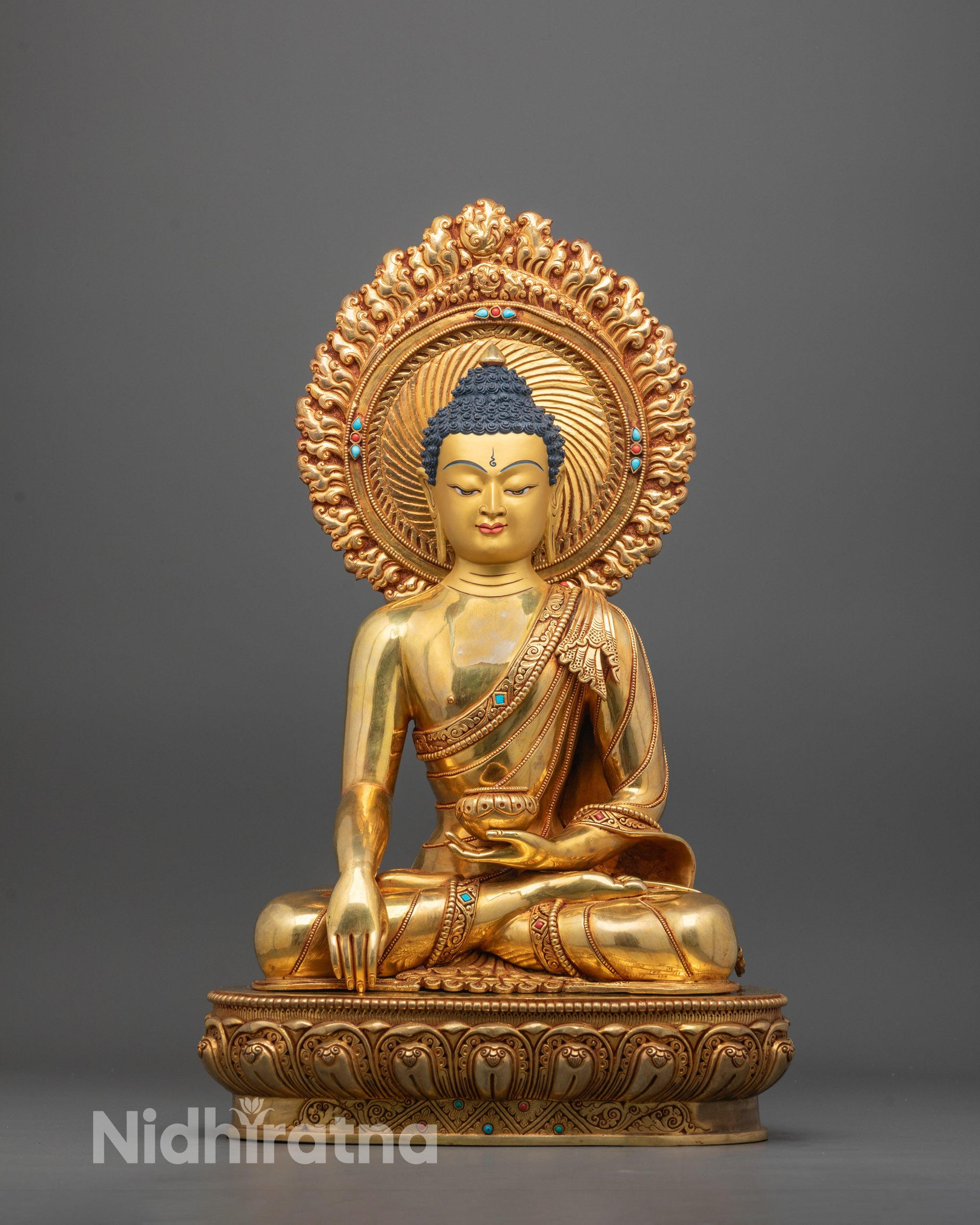 Front view of Shakyamuni Buddha Sculpture seated on lotus with bhumisparsha mudra