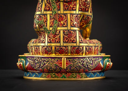 Lower landscape back view of Shakyamuni Buddha Statue showing intricate robe patterns and hand-painted halo details