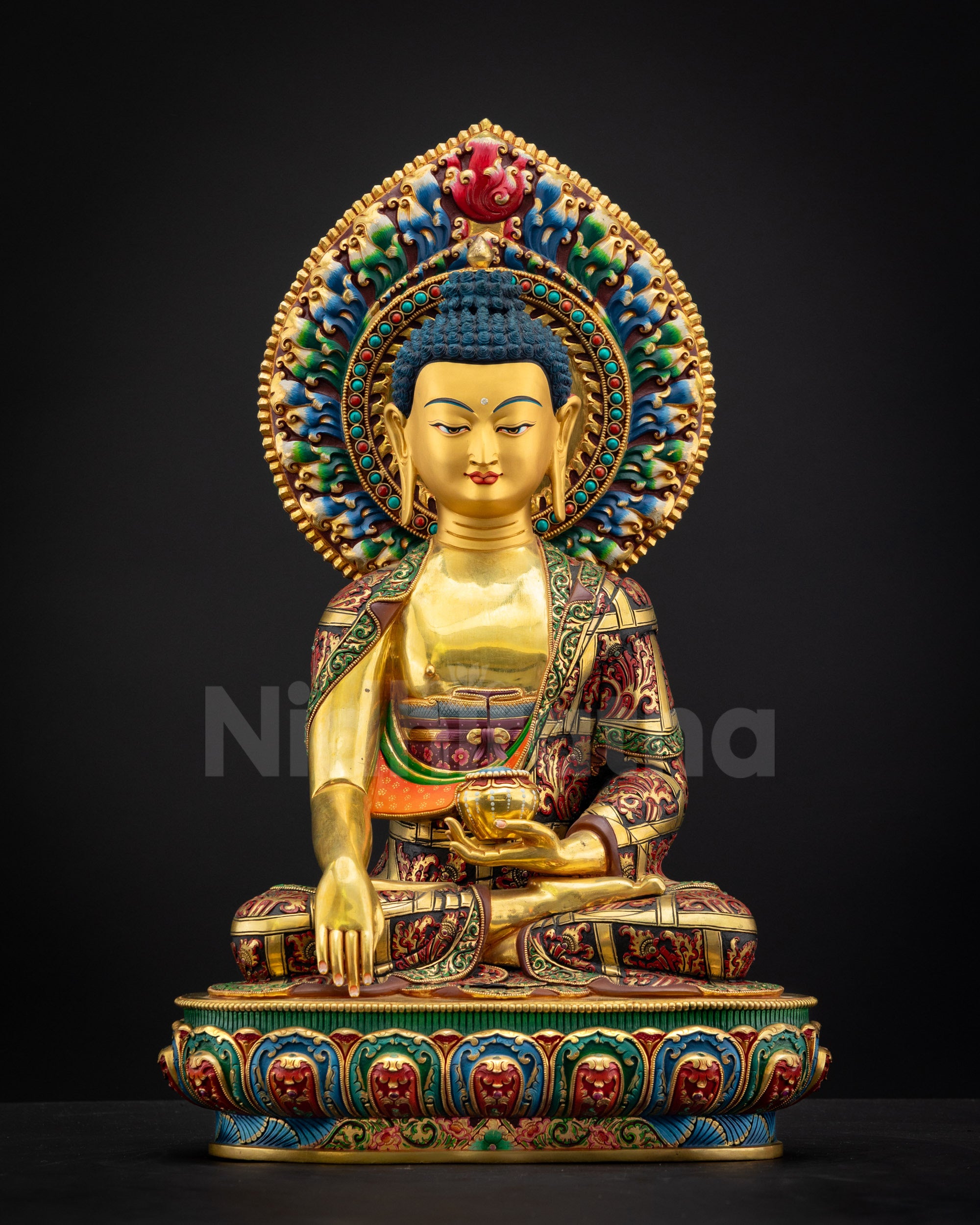 Front view of Shakyamuni Buddha Statue showcasing gold-fire gilded copper craftsmanship and multi-colored lotus throne