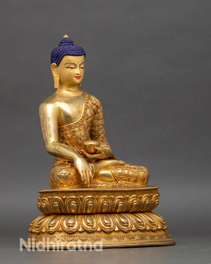 Right side view of Shakyamuni Buddha statue, fire-gilded copper, intricate robes, lotus seat, Nepalese craftsmanship