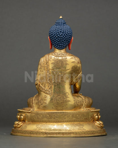 Back view showing carved robes and double-layered lotus seat of Buddha statue.