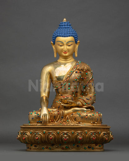 Front view of handcrafted Shakyamuni Buddha statue with gold-gilded base and lotus seat