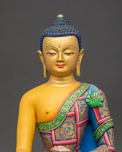 Shakyamuni Buddha Statue close up showing hand-painted robes and copper details
