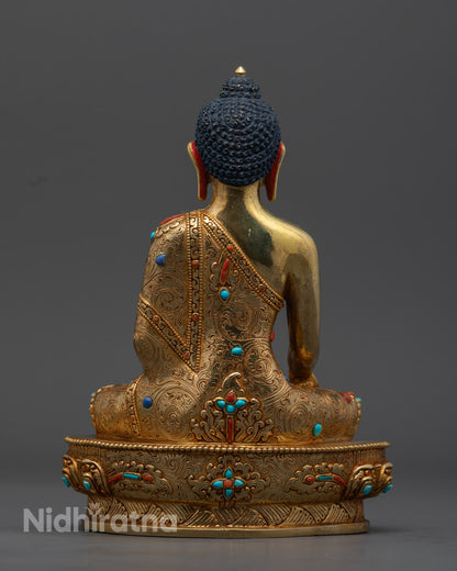 Shakyamuni Buddha Statue, emphasizing the 24K gold gilding and tranquil expression, symbolizing enlightenment and compassion