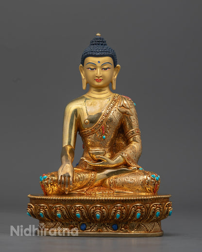 Shakyamuni Buddha Statue handcrafted from copper and gilded with 24K gold, seated in dhyanasana on a detailed lotus throne