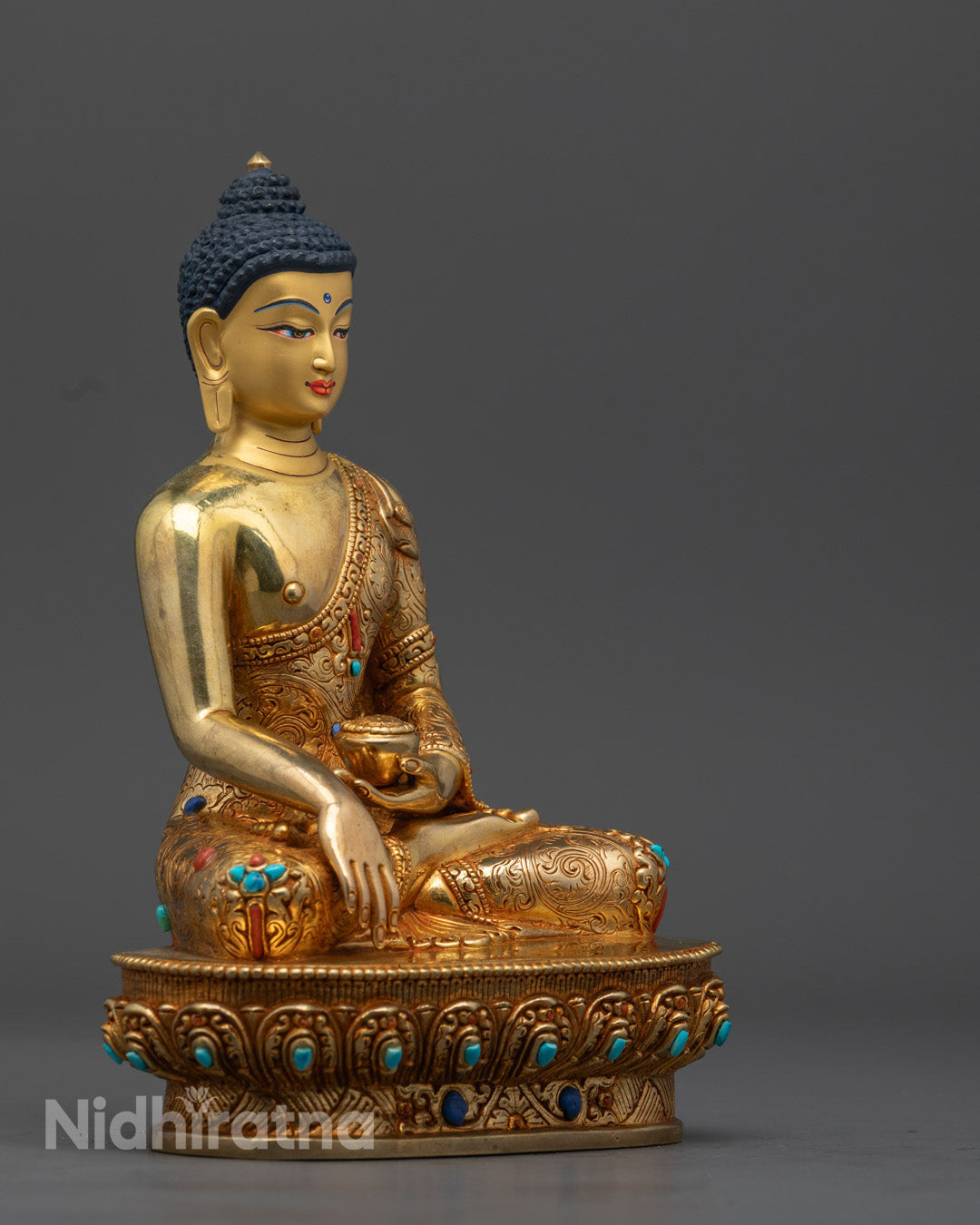Shakyamuni Buddha Statue showcasing the intricate craftsmanship of the lotus throne and serene posture, exuding spiritual peace and wisdom