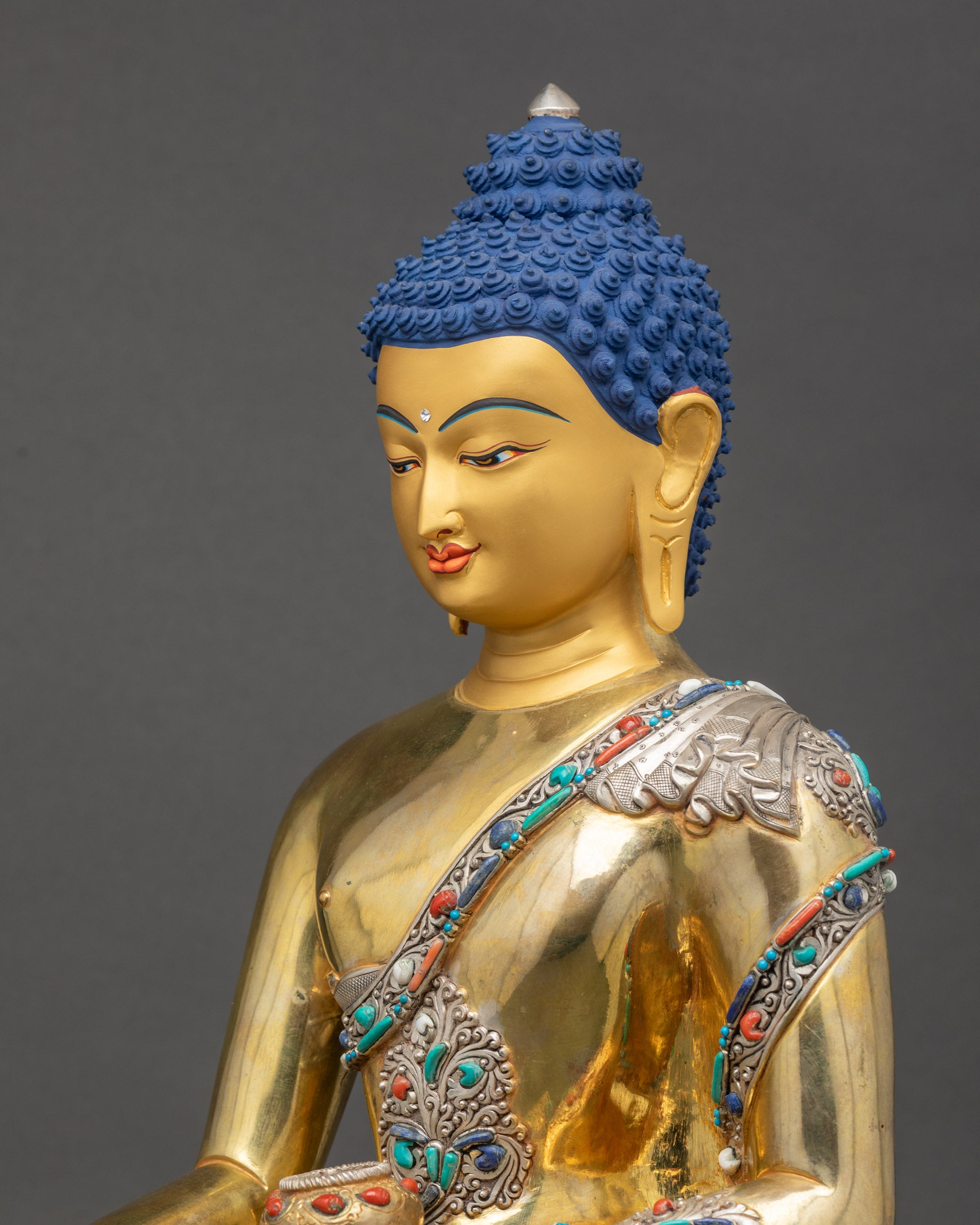 Shakyamuni Buddha Statue side close up intricate monk robe patterns Nepalese craftsmanship