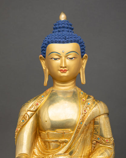 Shakyamuni Buddha close up meditation posture gold fire-gilded details