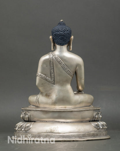 Shakyamuni Buddha holding monk’s bowl, gold-finished copper for meditation