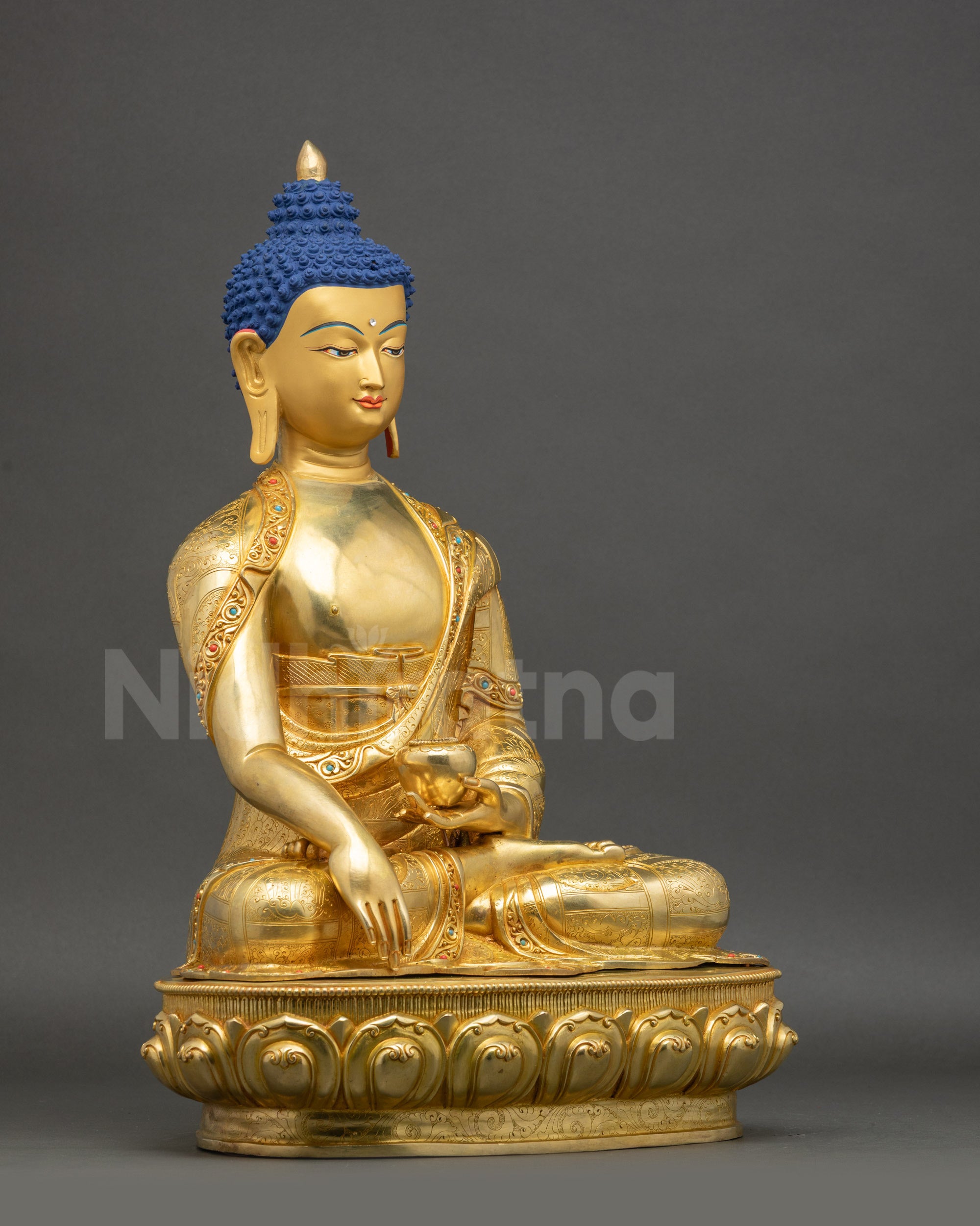 Shakyamuni Buddha right side view handcarved robes lotus base