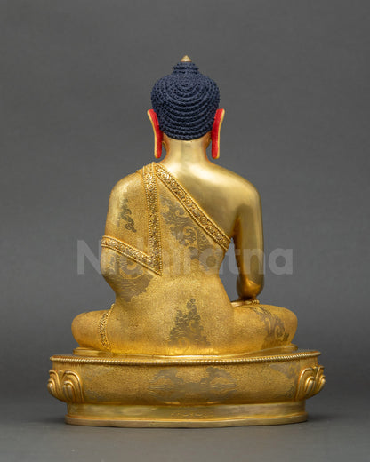 Shakyamuni Buddha statue back view showing detailed robe carving and Newari artistry
