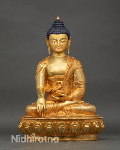 Shakyamuni Buddha statue earth touching mudra gold fire gilded copper Nepal