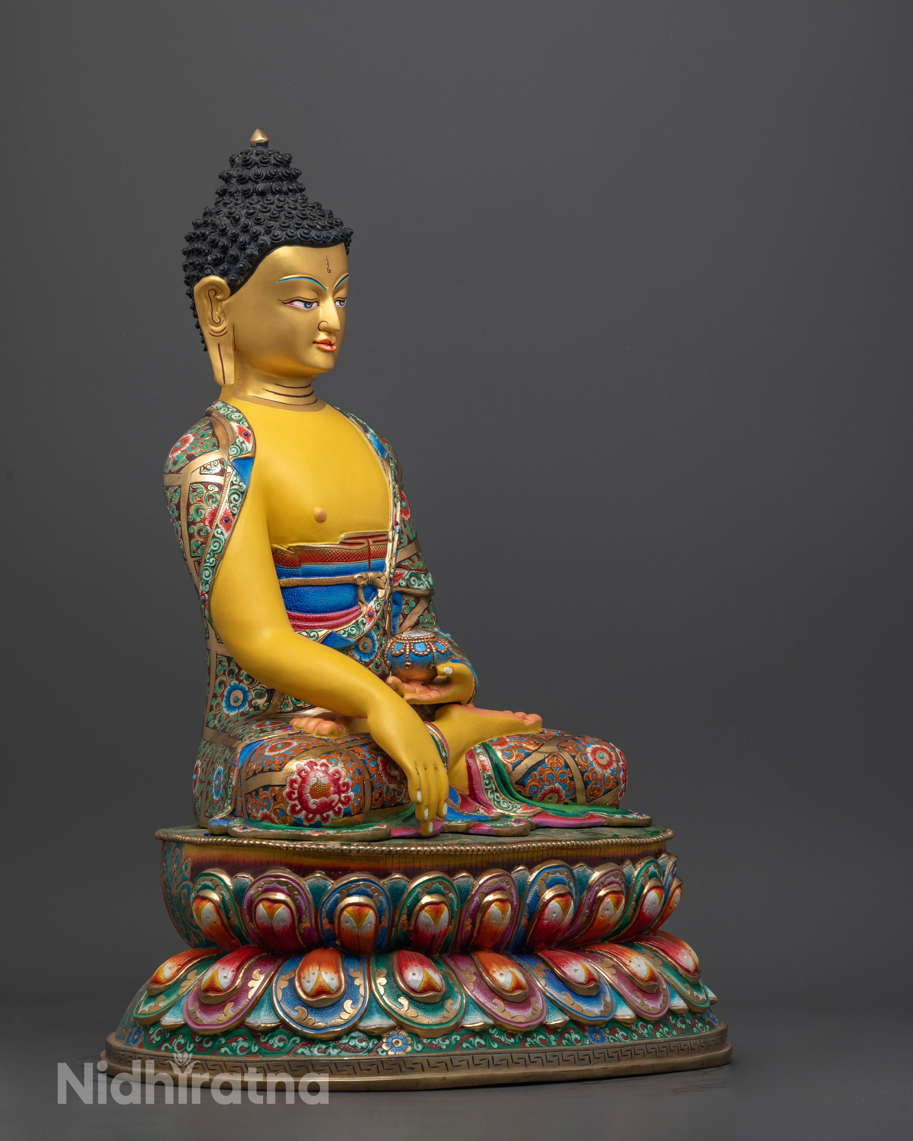 Shakyamuni Buddha statue, showcasing the elongated ears symbolizing knowledge and the ability to hear the suffering of all living beings, with a calm and enlightened posture.
