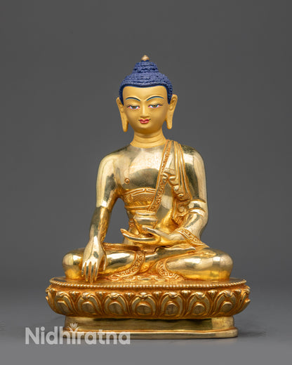 Shakyamuni Buddha statue front view gold fire-gilded lotus seat meditation