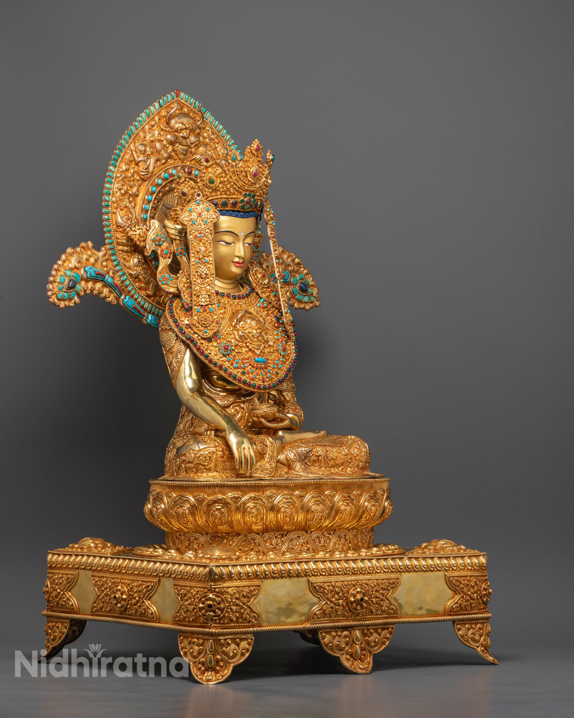 Shakyamuni Buddha statue holding monk bowl with detailed carvings