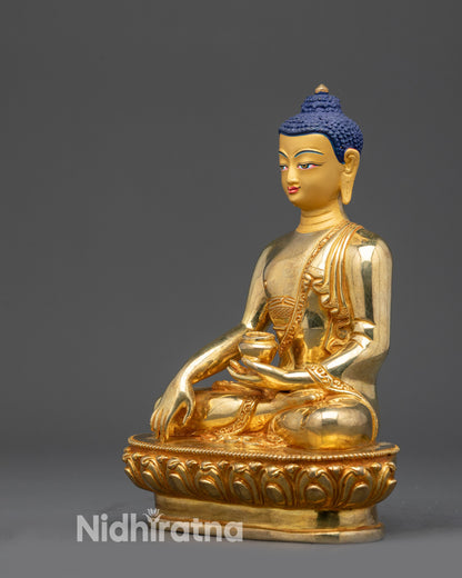 Shakyamuni Buddha statue left side view gold-gilded hand mudra and lotus seat