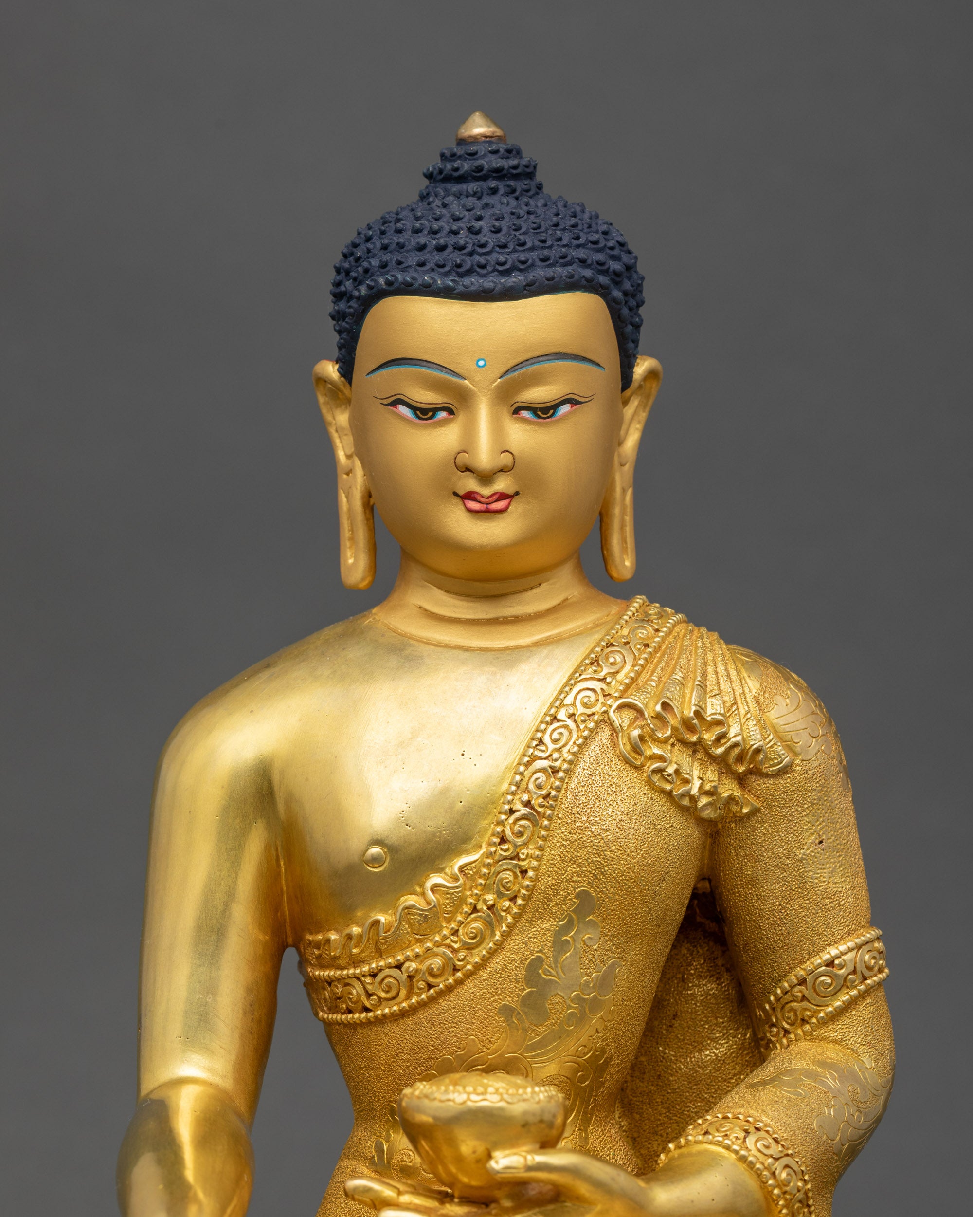 Shakyamuni Buddha statue regular close up showing lotus seat and patra bowl