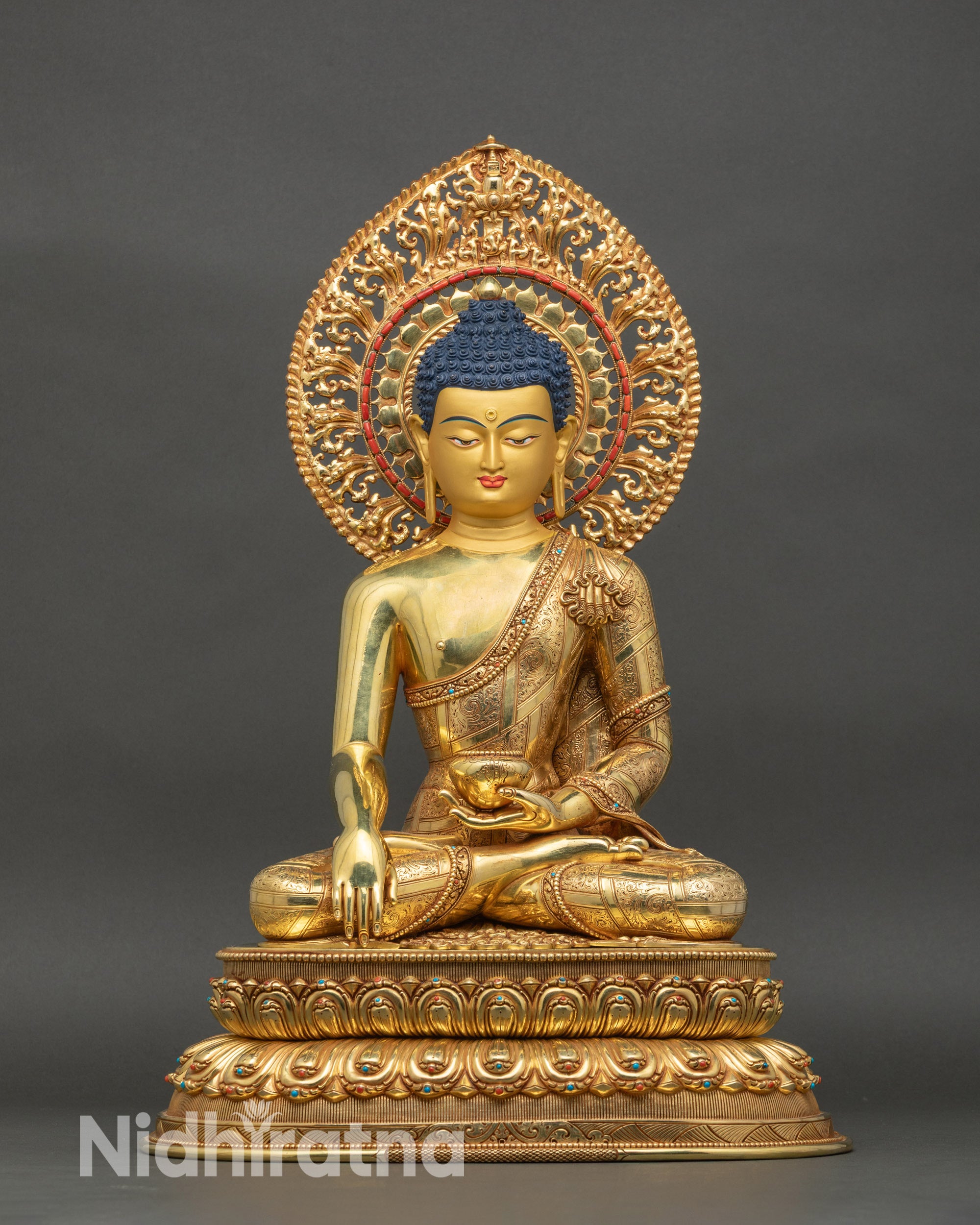 Shakyamuni Buddha statue seated in meditation, gold-gilded Nepalese artwork