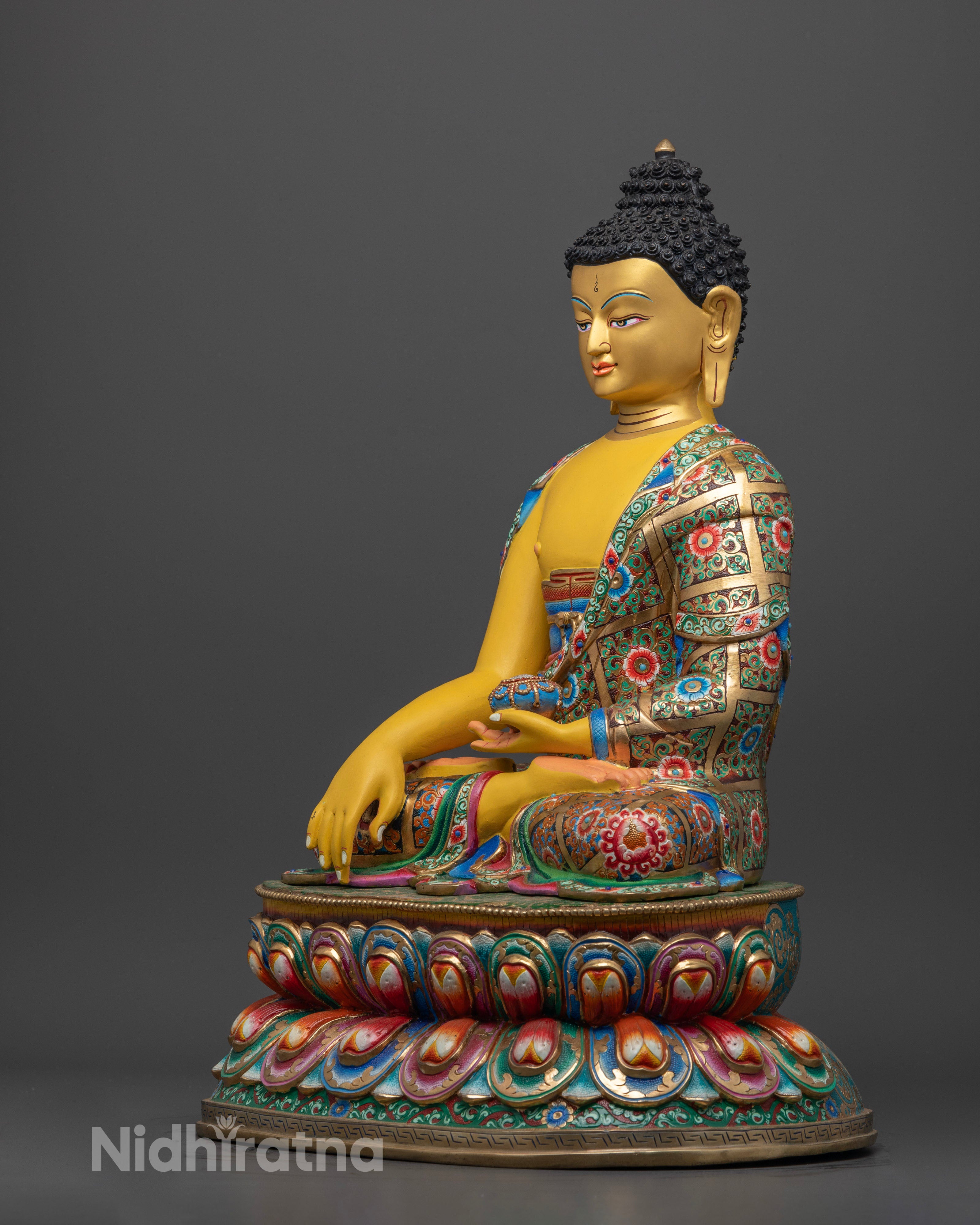 Shakyamuni Buddha statue, emphasizing the fine details of the lotus throne and the symbolic earth-touching gesture representing his spiritual victory over ignorance.