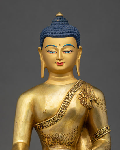 Shakyamuni Buddha statue with 24K gold fire-gilded finish and serene meditative posture