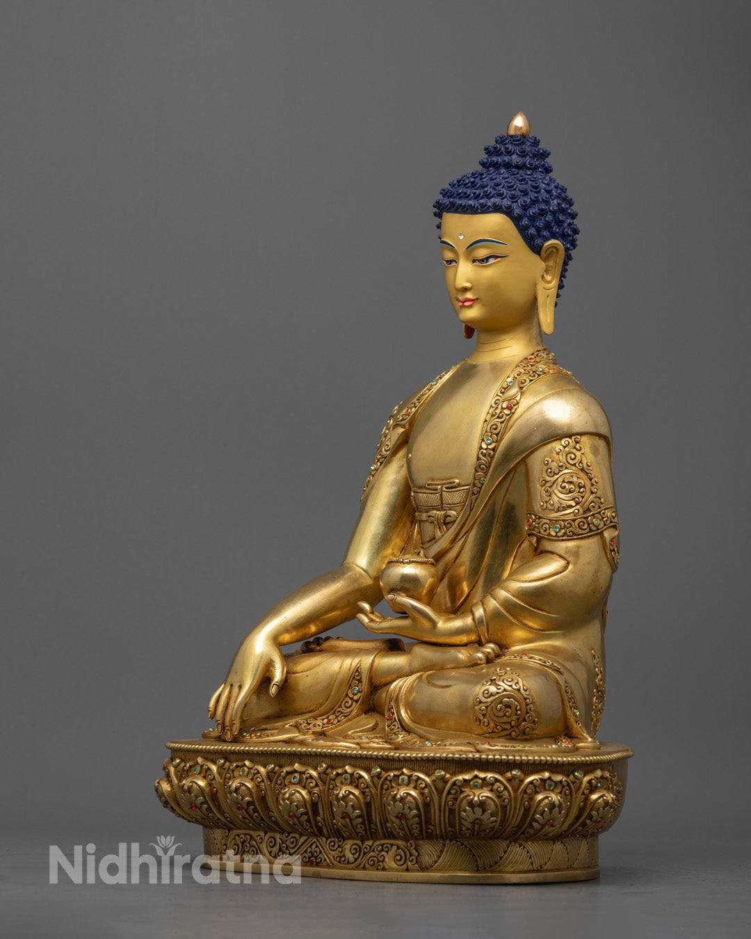 Shakyamuni Buddha with beautiful carvings and serene expression.
