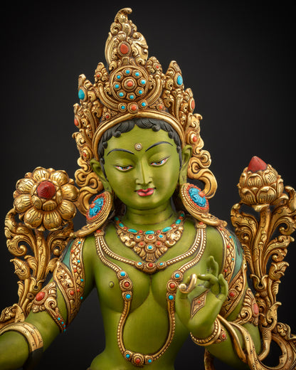 Regular close up of Shyama Tara Buddhist statue highlighting lotus pedestal serene posture