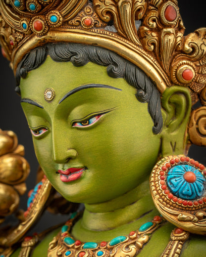 Detailed side face close up of Green Tara statue highlighting calm gaze premium acrylic colors and refined carving