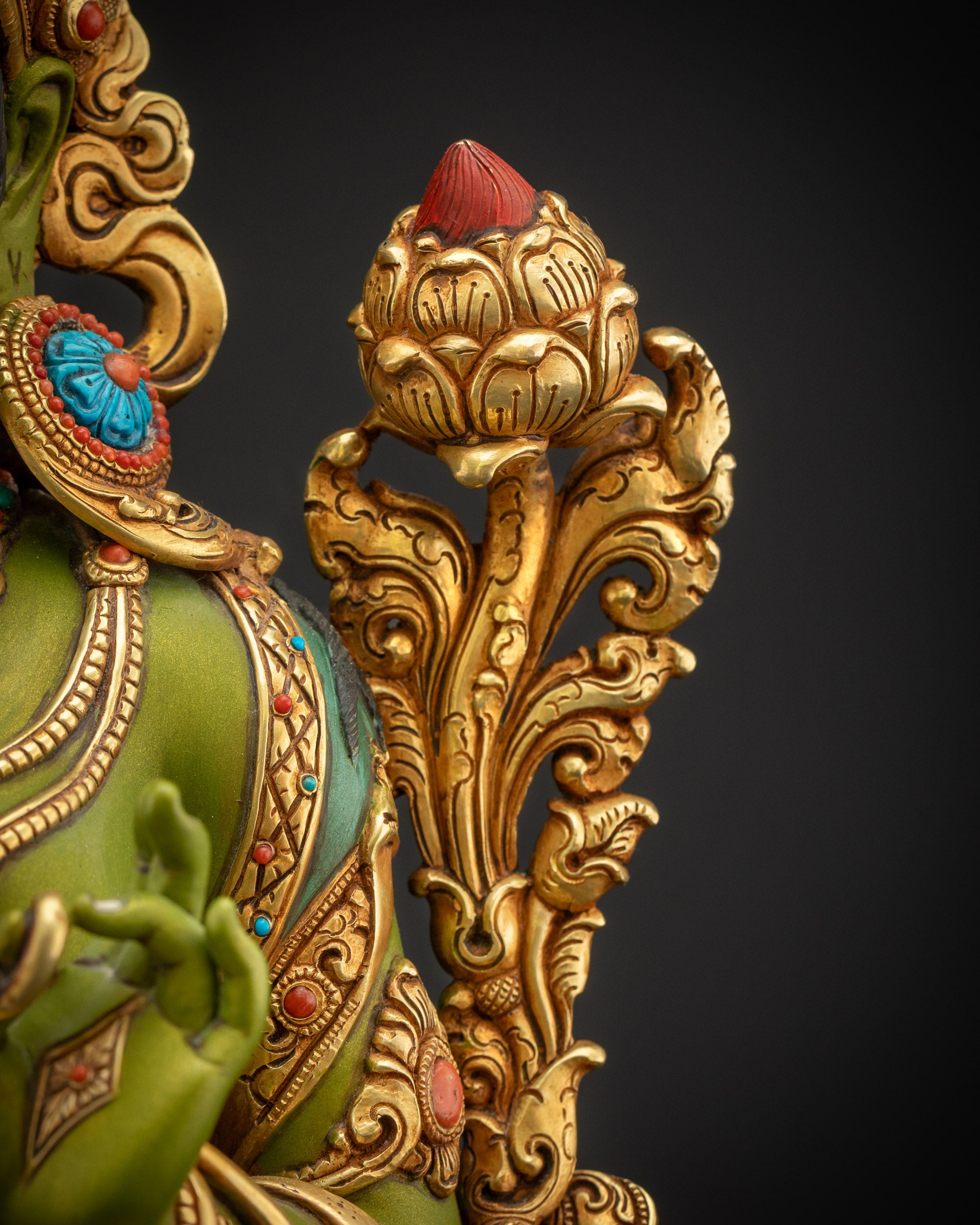 Detailed close up of utpala flower held by Shyama Tara representing compassion purity