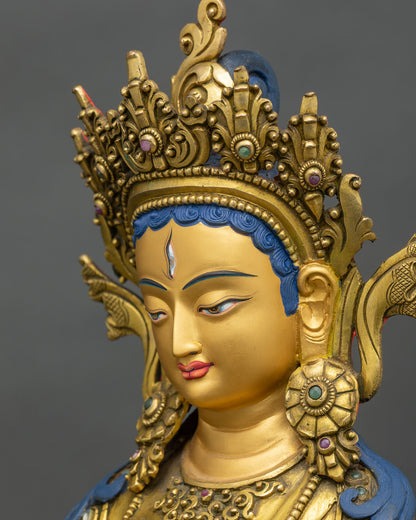 Side face close-up Dukar statue, serene gold face and jeweled crown detail