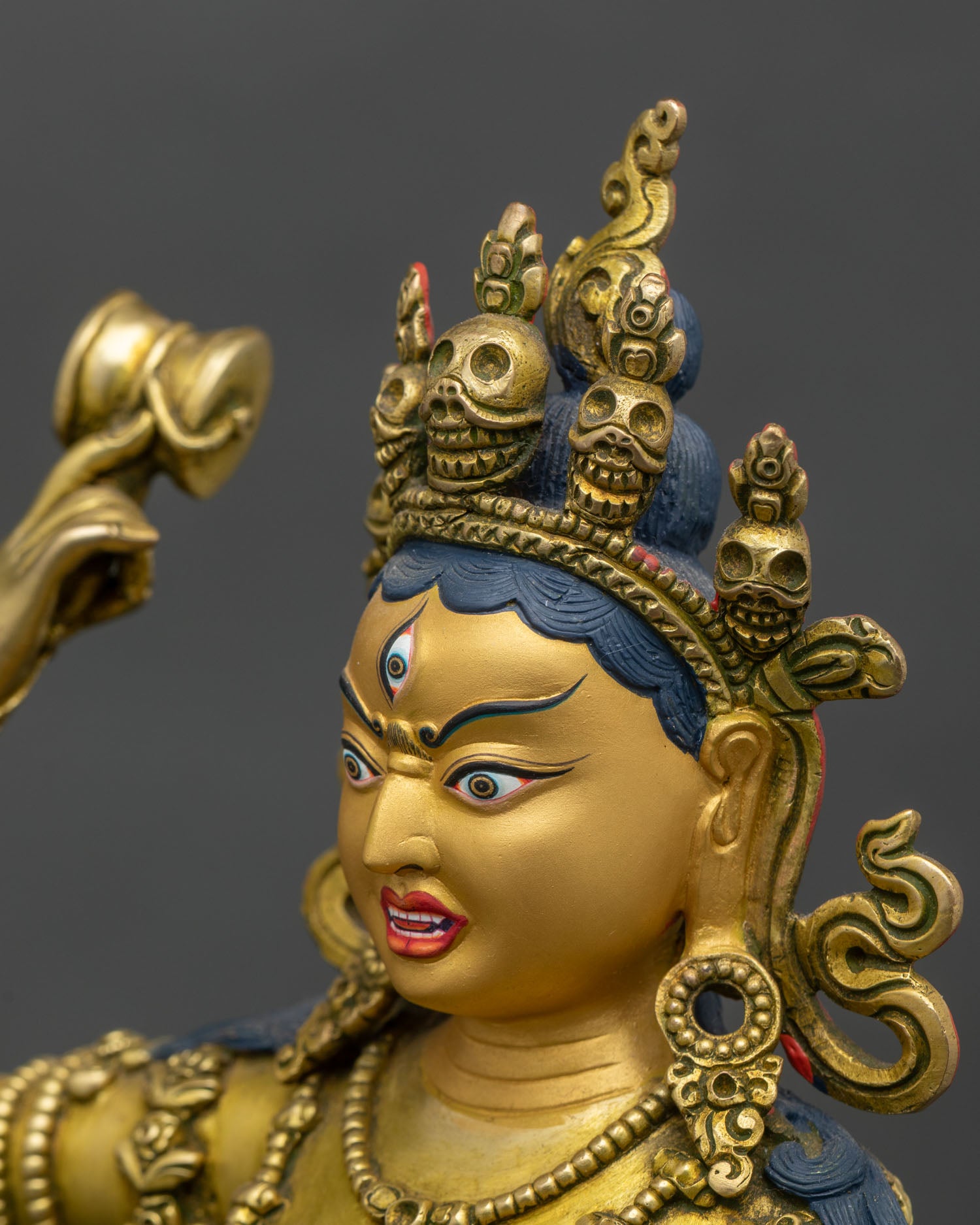 Side face close-up of Achi Chokyi Drolma, intricate halo and facial features