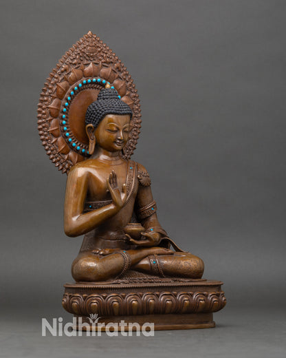 Side-view-Amoghasiddhi-Buddha-lotus-pedestal-elaborate-aureole-gold-oxidized-Nepalese-sculpture
