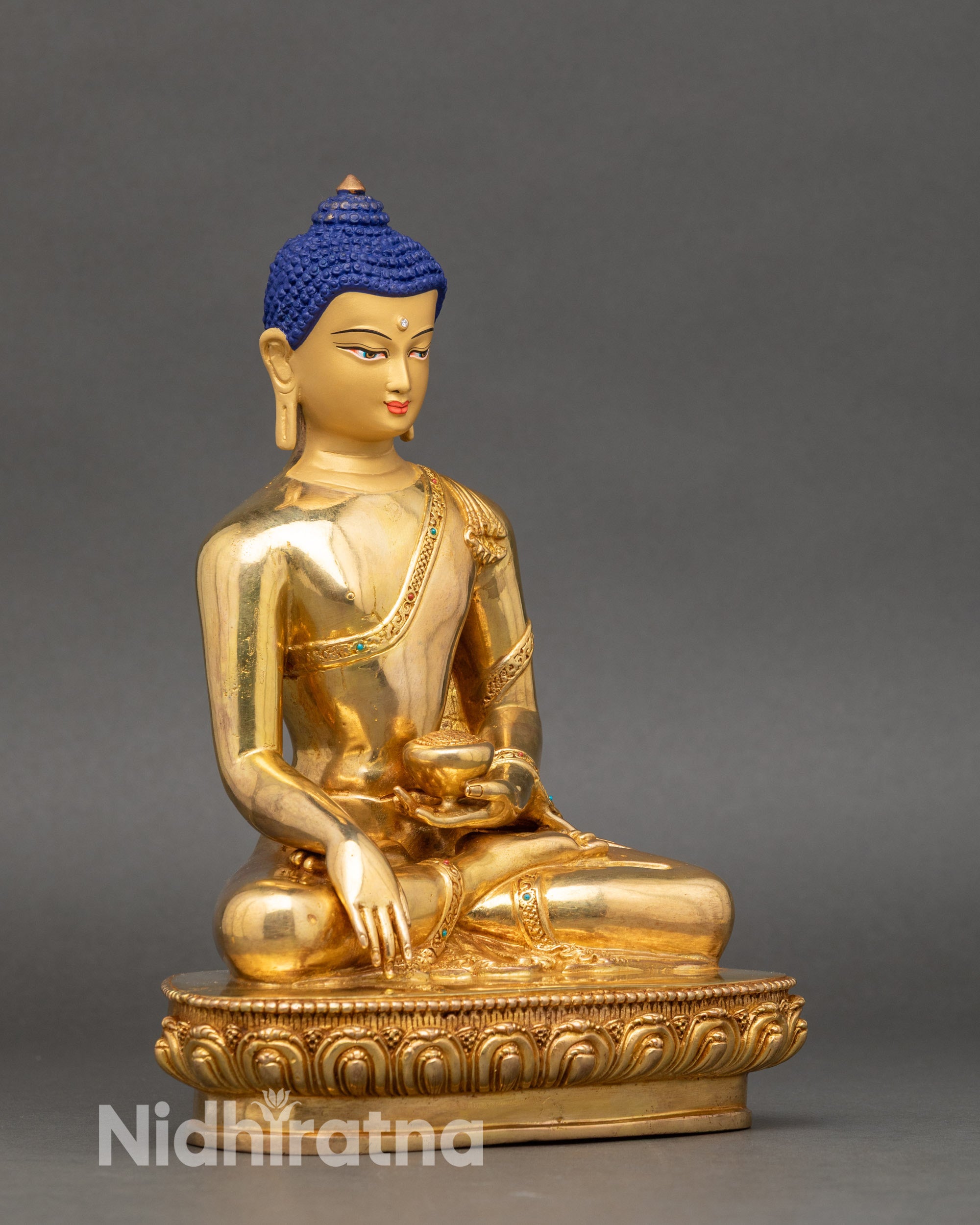 Side-view-Buddha-robe-details-turquoise-coral-stones-lotus-pedestal-spiritual-sculpture