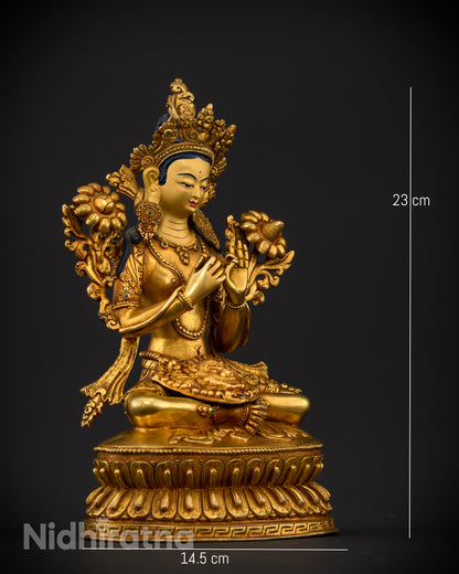 Side view of Green Tara statue lalitasana posture right leg extended spiritual home altar decor