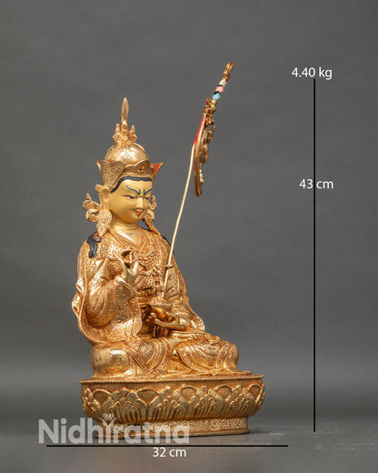 Side view of Guru Tsokye Dorje holding skull cup and vajra Tibetan Buddhist meditation statue
