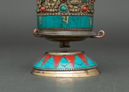 Side view Tibetan Prayer Wheel intricate carvings spins smoothly home altar spiritual decor