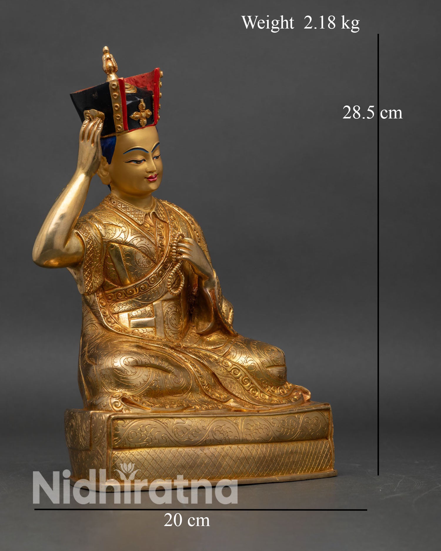 Side view of 16th Karmapa Statue seated lotus pedestal flowing motif patterns meditative altar decor