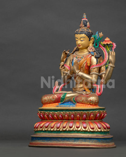 Side view of Chenrezig Statue holding crystal rosary lotus and wish-fulfilling jewel.