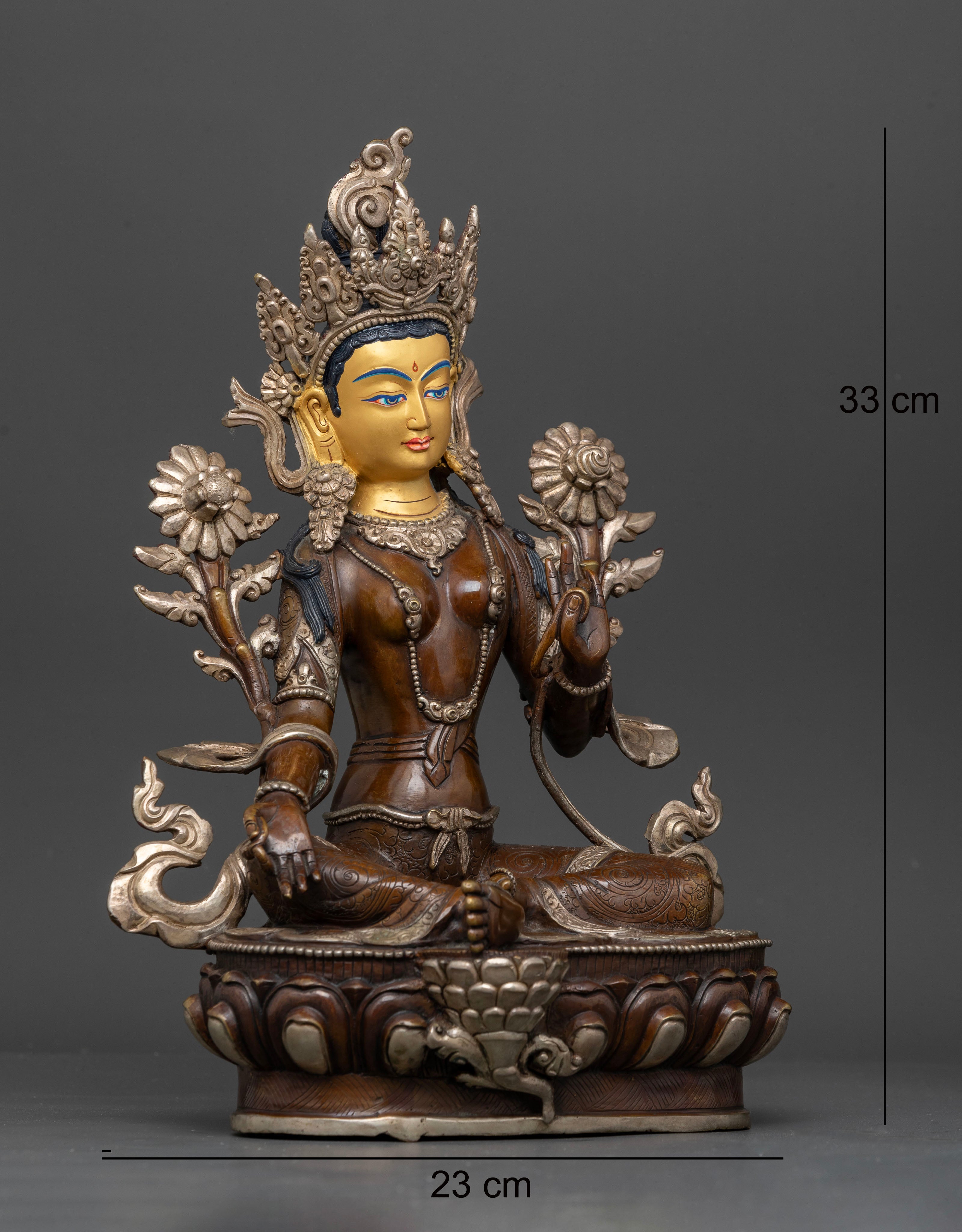 Side view of the Green Tara Statue seated in the lalitasana posture.