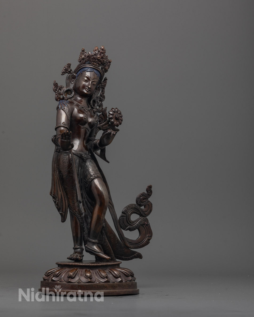 Side-view of Sita Tara Sculpture with seven eyes symbolizing divine awareness 
