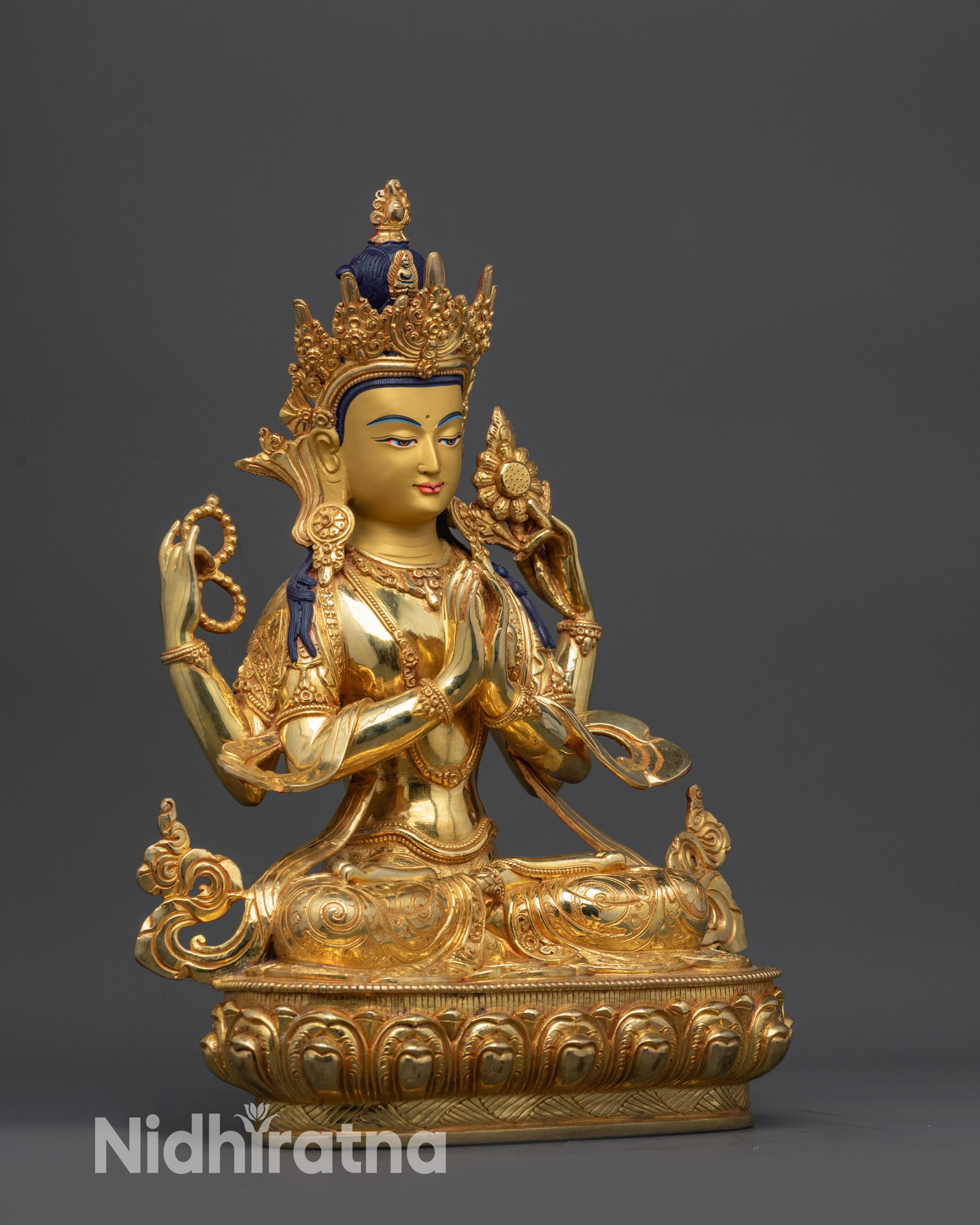 Side Angle of Chenrezig Statue Displaying Intricate Robe and Lotus Throne