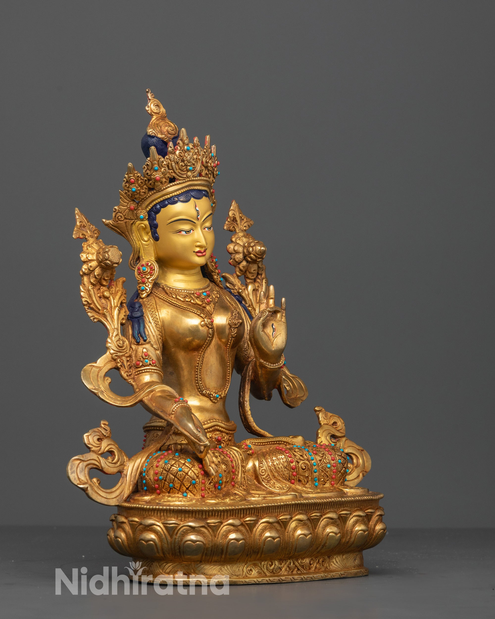Side Angle of Copper-Based White Tara Statue with Intricate Lotus Seat