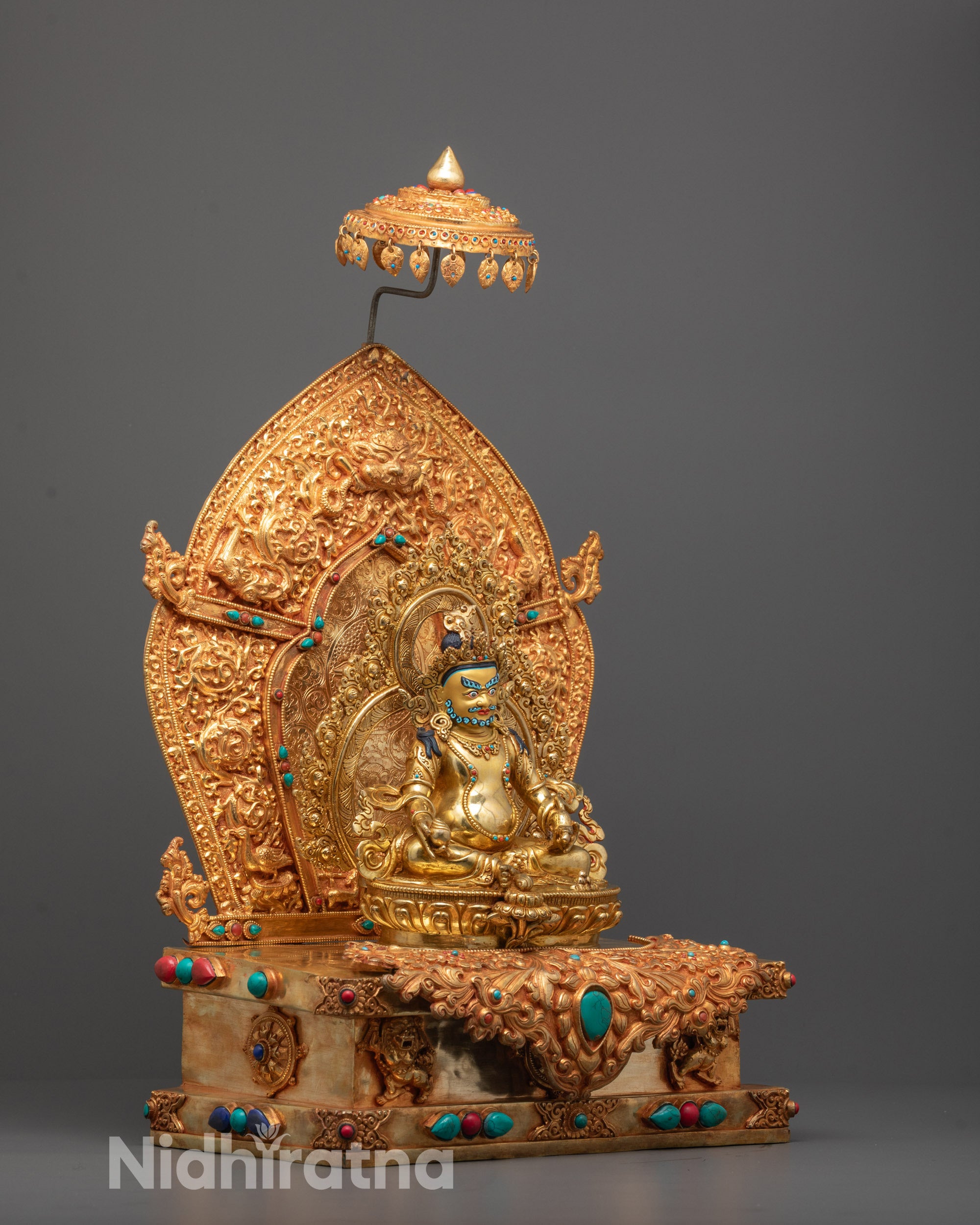 Side Angle of Dzambhala on Lotus Seat | Dzambhala depicted in a side pose