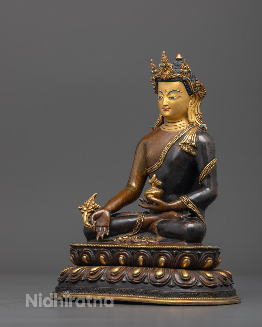 Side Angle of Medicine Buddha Sculpture Featuring Semi-Precious Stone Inlays