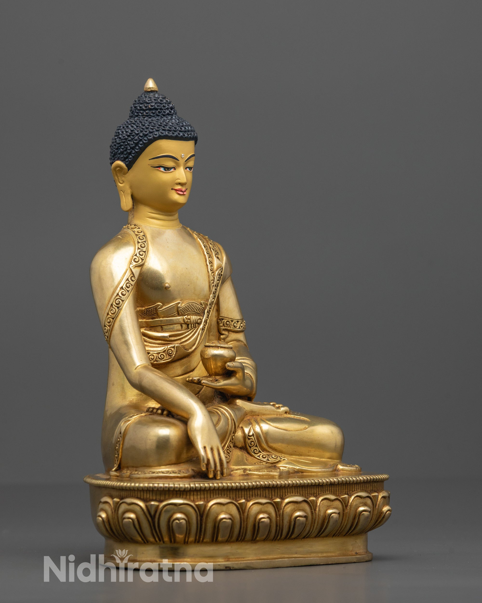 Side Angle of Shakyamuni Buddha Holding Monk’s Bowl with Intricate Robe Detailing