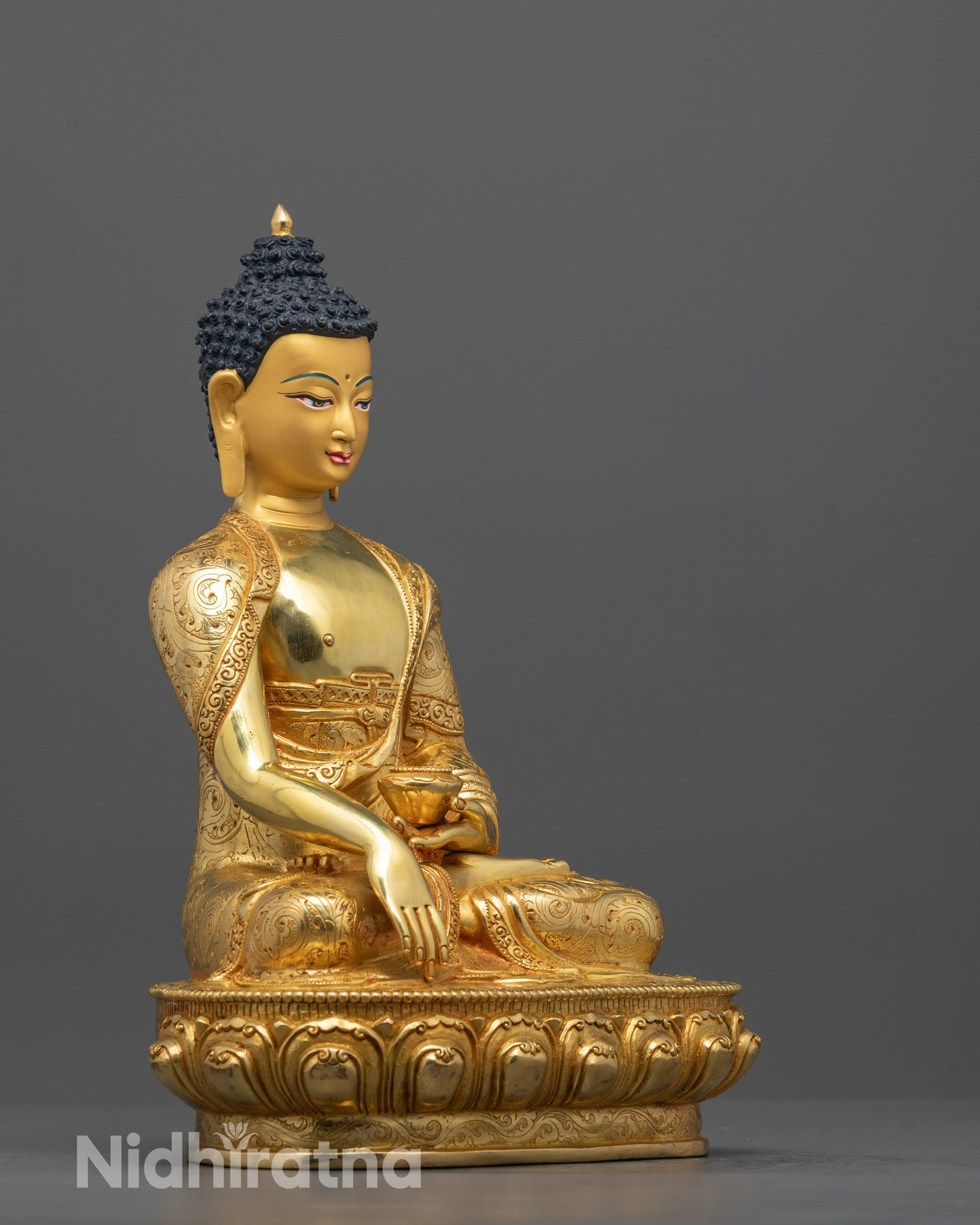 Side Angle of Shakyamuni Buddha Statue Showcasing Lotus Base and Detailed Robe Work