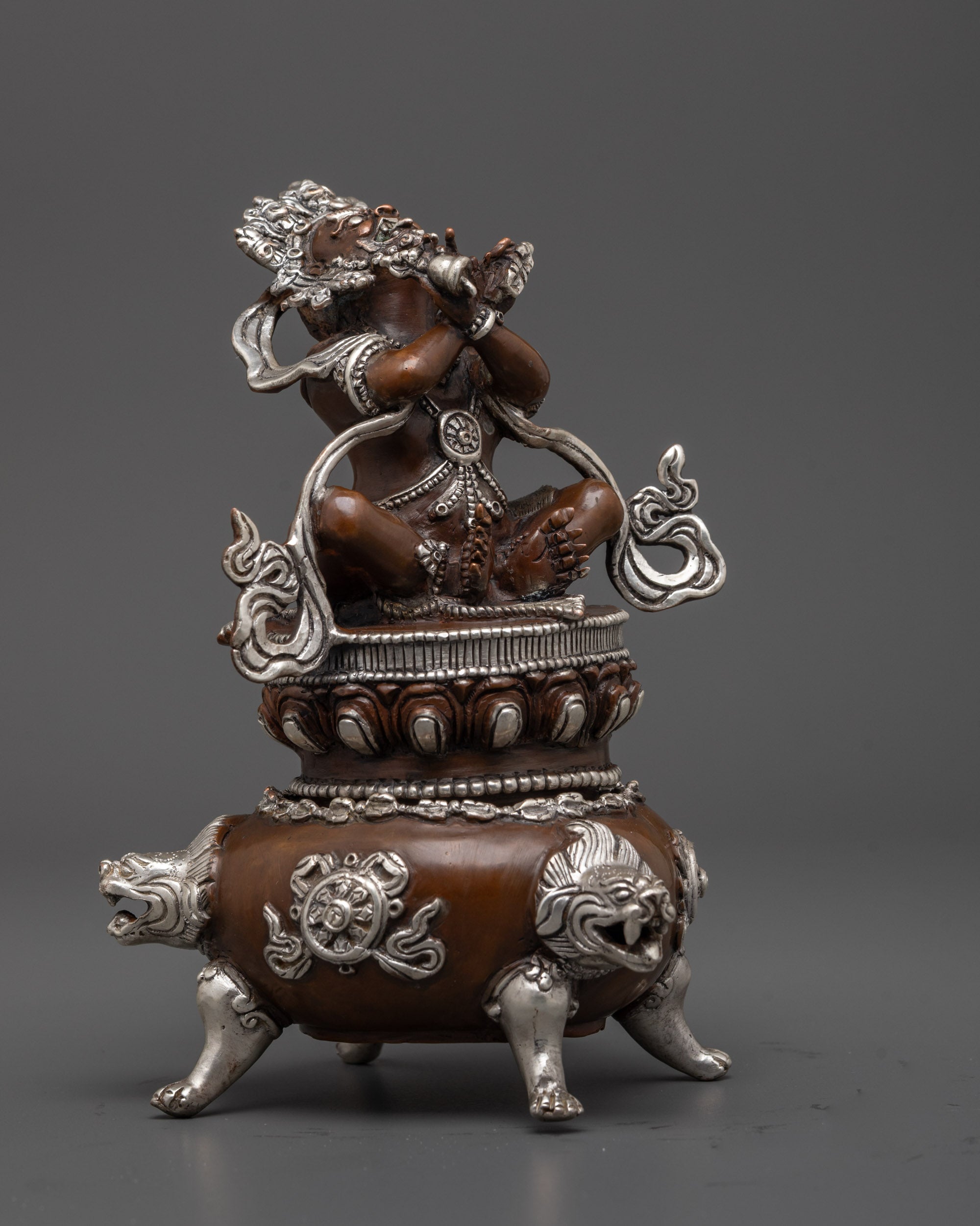 Side Profile of Vajradhaka Buddha Sculpture with Sacred Implements