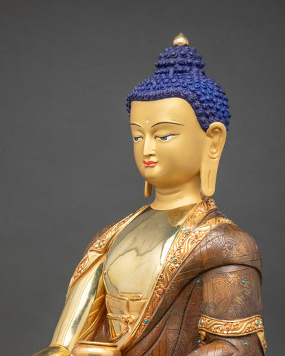Side close-up of Buddha Statue highlighting lotus seat and floral monk’s robes
