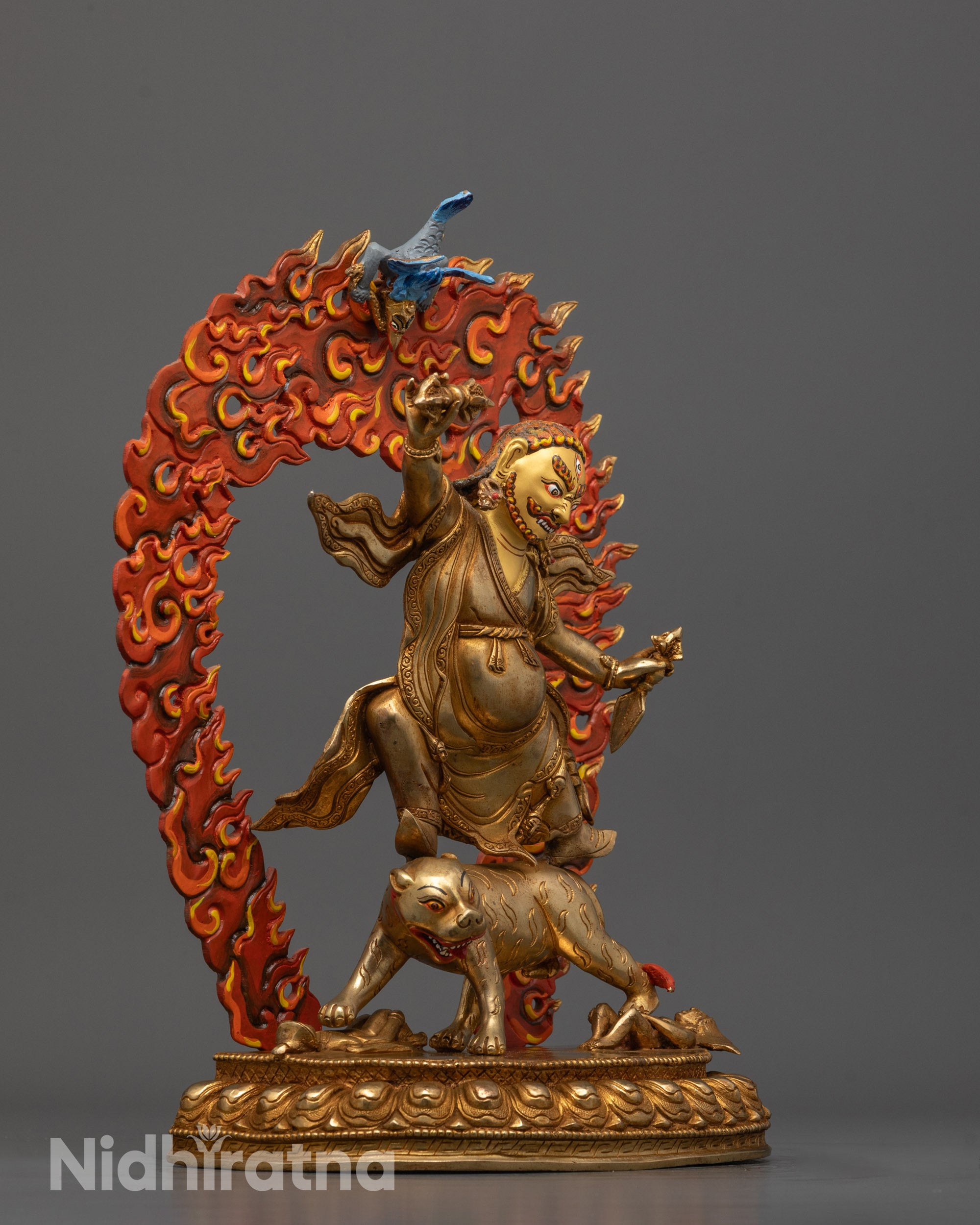 Side View of Dorje Drolo Standing on Lion Depicting Dynamic Posture