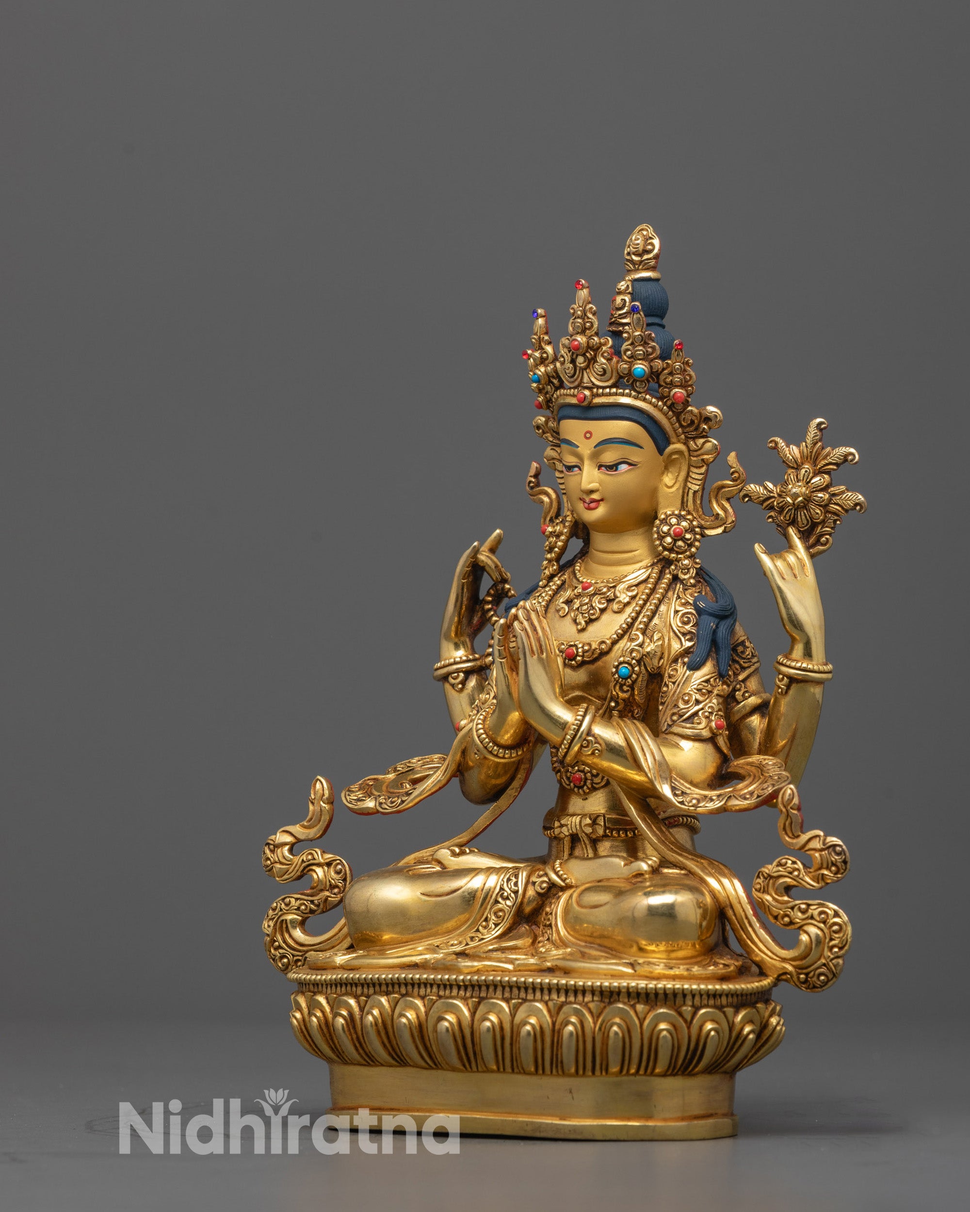Side View of Four-Armed Chenrezig Statue Showing Elegant Mudras